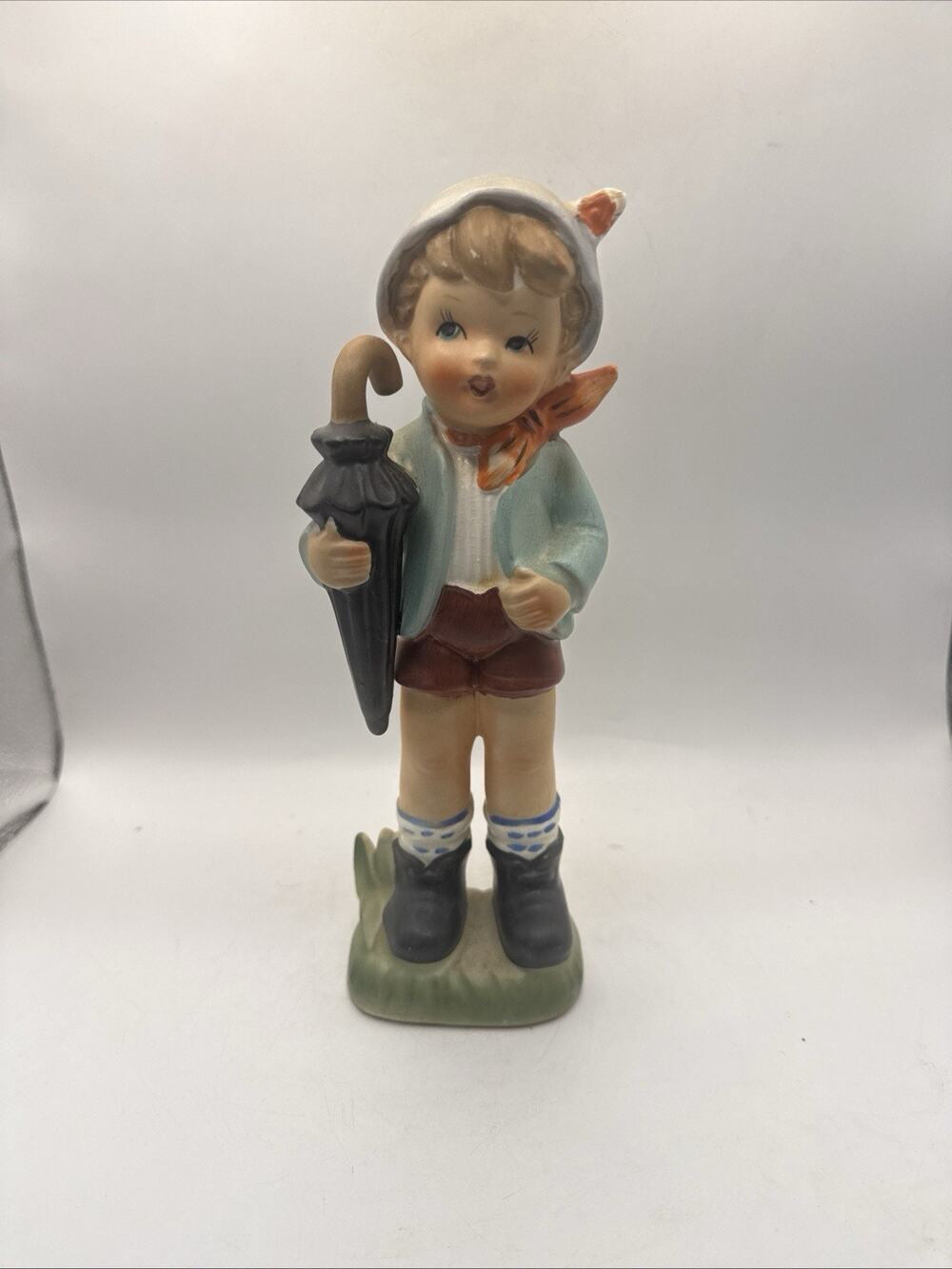 Wales Boy with Umbrella Ceramic Figurine *